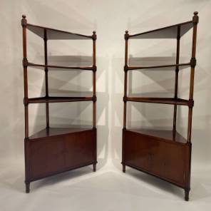 A Pair of Corner Cabinets by Pierre Lottier